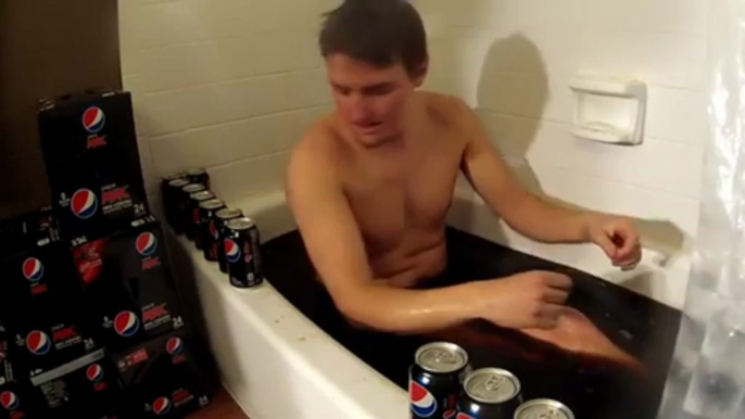 Crazy guy takes 500 cans of Pepsi Cola bath!! Strange way to relax after a hard working week...