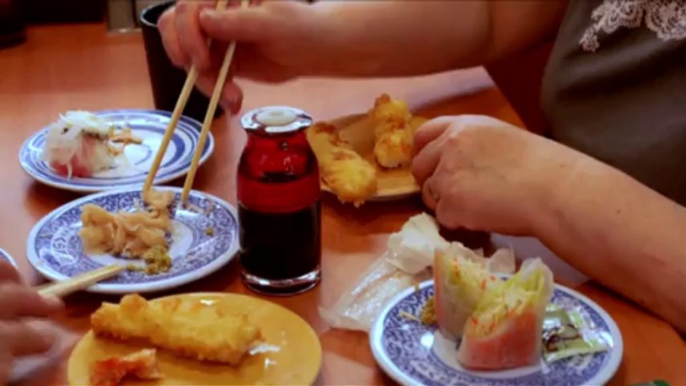 Sushi-go-round -- Japan tradition served with technology