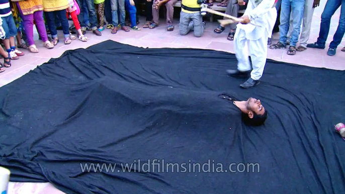 Thrilling Street Magic levitation at Dilli Haat Magic Fest