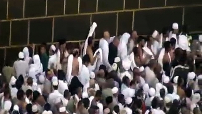 Hajj view of the Kaaba as pilgrims walk