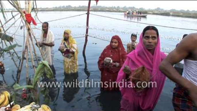 Devotees offer prayers and seek blessing during Chhath puja, Delhi