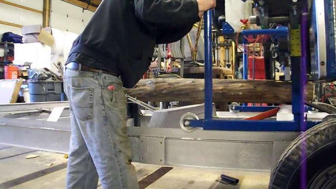 Homemade Portable Sawmill Cutting it's first boards