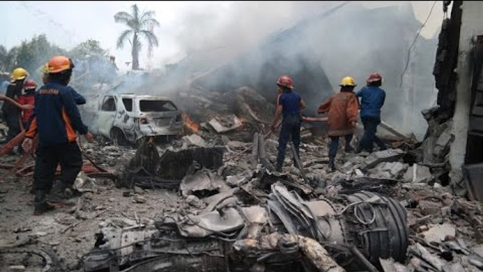 RAW: Giant Indonesia C-130 Hercules military plane crashes in residential area of Medan