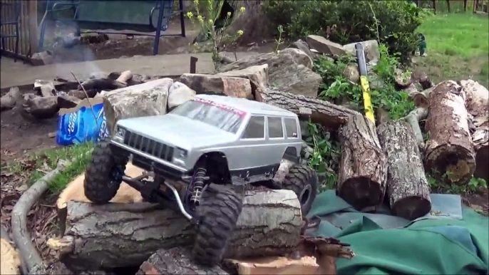 Two RC Jeep Cherokee XJ Rock Crawler 4x4 Trucks Axial SCX10 Honcho And Exceed Mad Torque