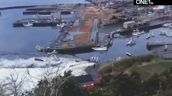 earthquake in japan 2011:  people/cars trying to escape the tsunami footage japan