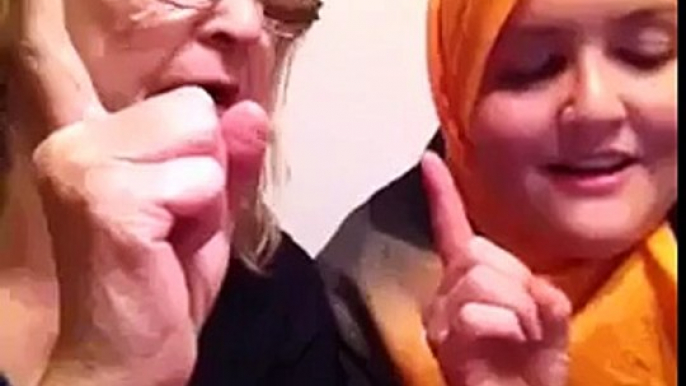 An American girl embraces her mother to Islam