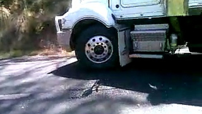 truck bogged on tar road 49 deg Australia @ its hotest