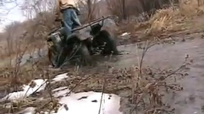 Honda Rancher 350 4x4 put to the test, mud, ice, water, air..Mudding, offroading! BADASS ATV!!