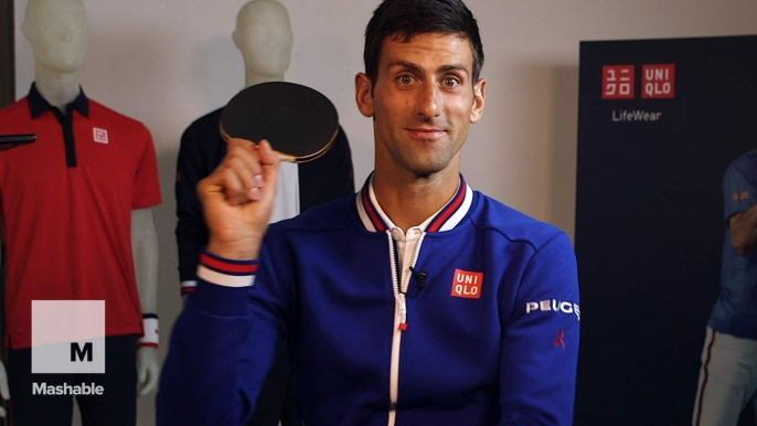 Novak Djokovic multitasks, interviews while bouncing his balls