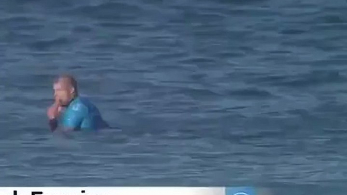 Mick Fanning fends off attacking shark