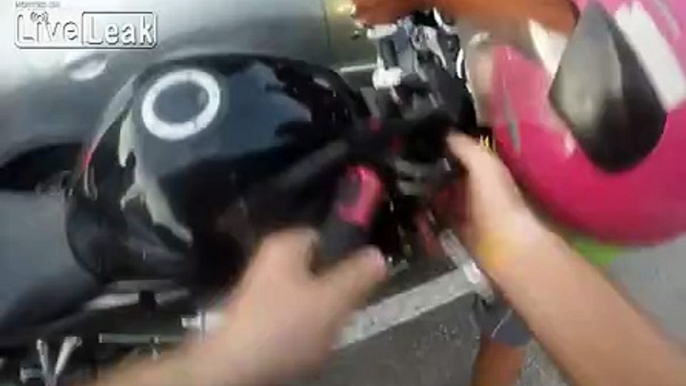 Rider falls on his motorbike by carelessness of another biker