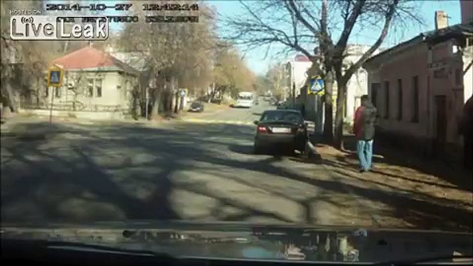 Four people waiting to cross the road are ran over after car accident