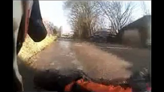 Motorcycle crash on icey road HELMETCAM]