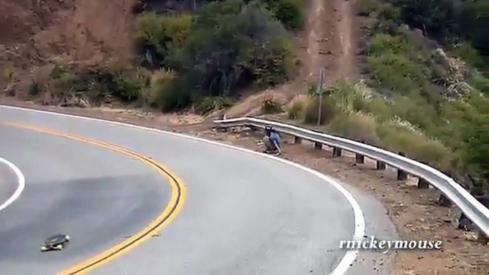 Longboarder Crashes into Guardrail