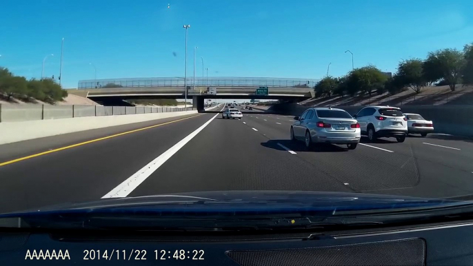 Arizona DPS Highway Patrol car nearly rear ended during rolling road block