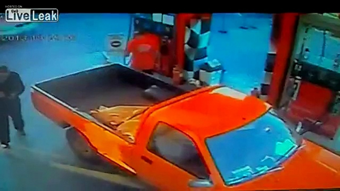 Woman driver crash at refuel station