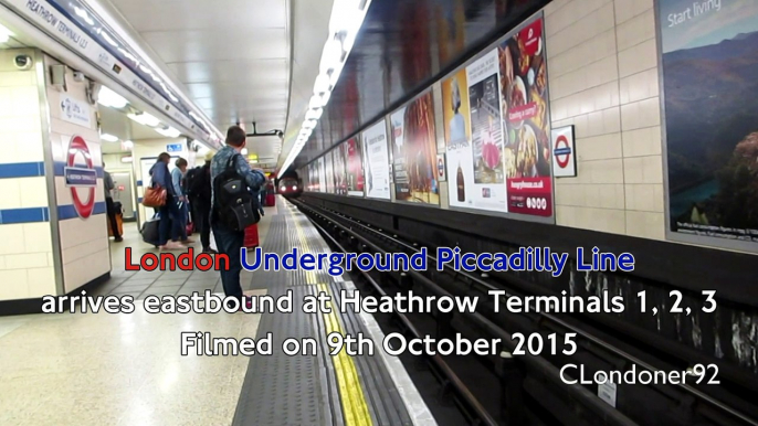 London Underground Piccadilly Line arrives eastbound at Heathrow Terminals 1, 2, 3