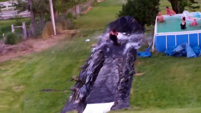 Guy Flies Off Epic Backyard Slip N Slide - Hilarious FAIL