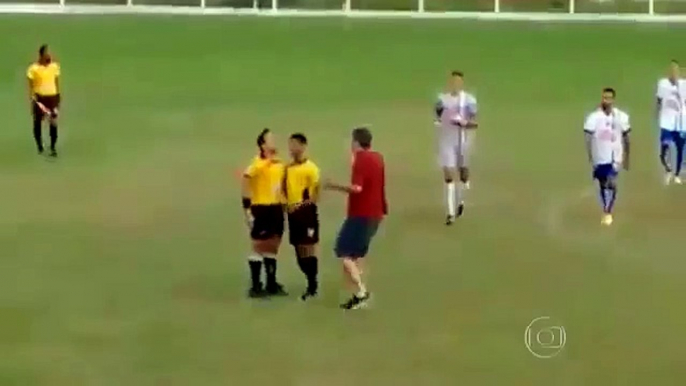 Referee pulls out a GUN during football match in Brazil