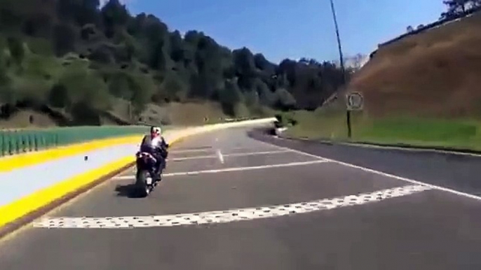 Motorcyclist Clips The Median And Gets Launched-Amizng-Videos Clips- Funny Videos Collection