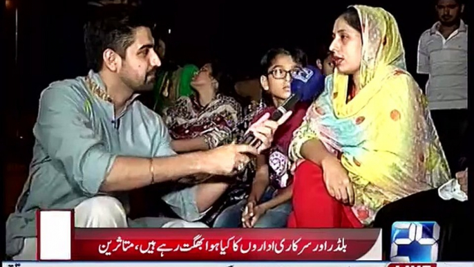 Syed Haider Ali talks with people of Moon Garden Karachi