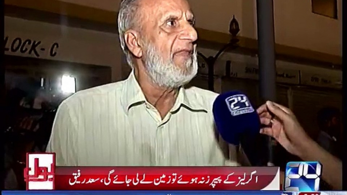 Syed Haider Ali talks with people about orders of Moon Garden Karachi