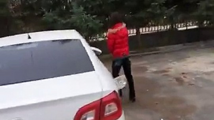 Wife smashes cheating husband's car