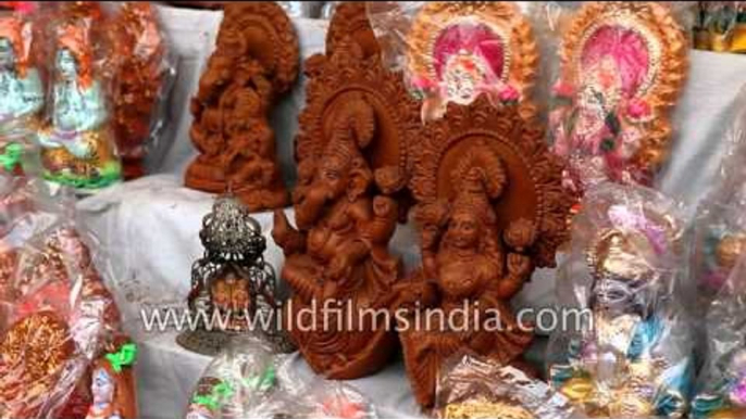 Idols of Goddess Lakshmi and Lord Ganesha at a market in Agra