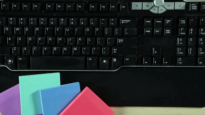 Clean Your Keyboard With Post-It Notes