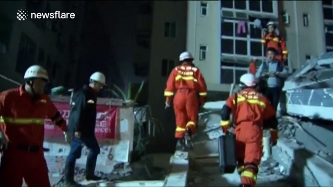 Rescue efforts continue into the night after massive landslide in southern China