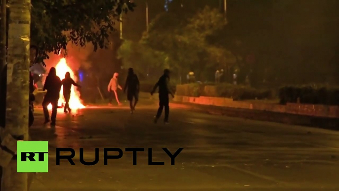 Greek Clashes: Protesters throw stones, bottles at riot police