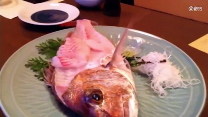 Half eaten fish jumps from plate, shocking diners Sashimi Fish Jumps Up From Dinner Plate