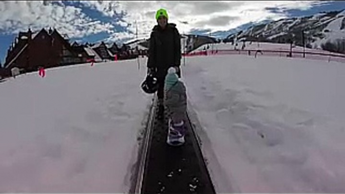 Baby on snowboard