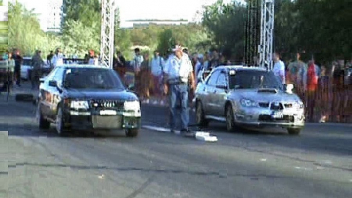 Audi S2 Coupe Vs. Subaru Impreza WRX STI Drag Race