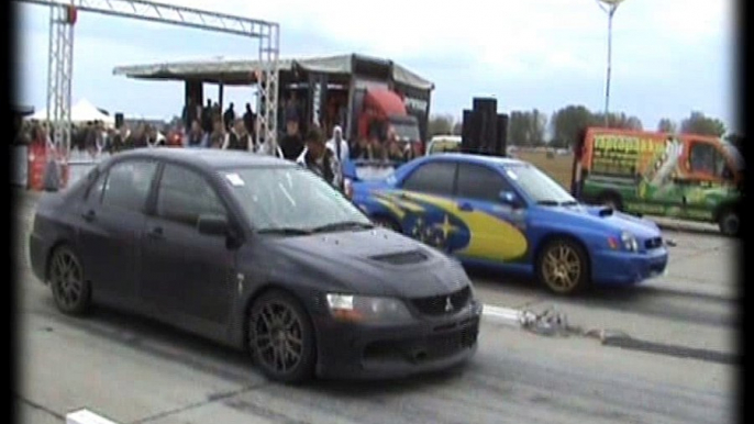 Mitsubishi Lancer EVO IX Vs. Subaru Impreza WRX STI Drag Race