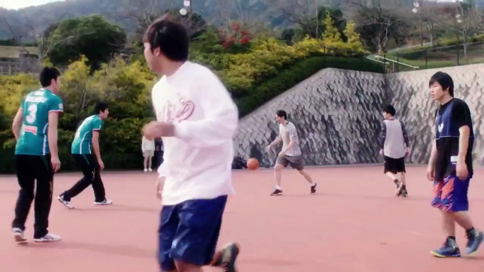 Professional volleyball players playing basketball