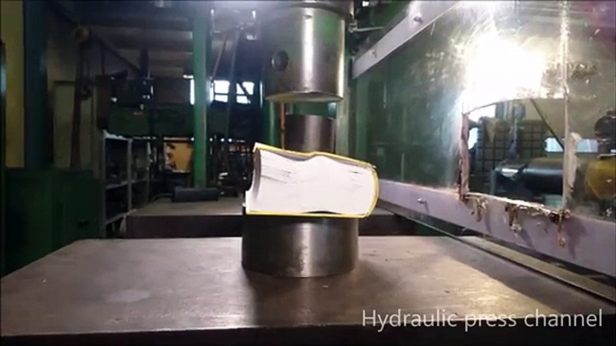 Crushing book with hydraulic press