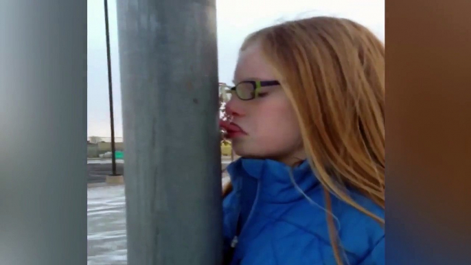 Girl Gets Tongue Stuck On Frozen Pole