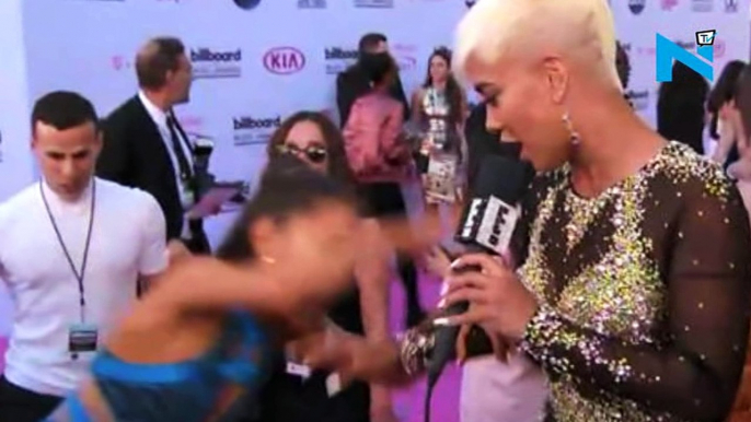 Ariana Grande skips a really bad fall on BBMAs red carpet