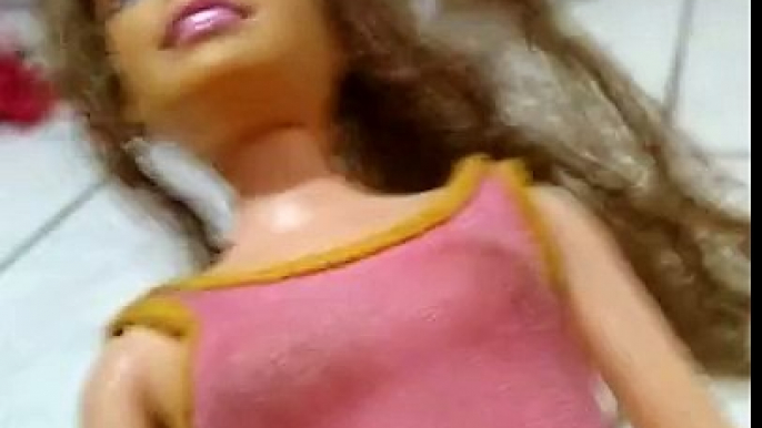 Barbie.corta o cabelo