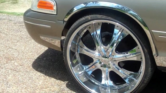 Crown Vic On 26's + 2 15" Kickers