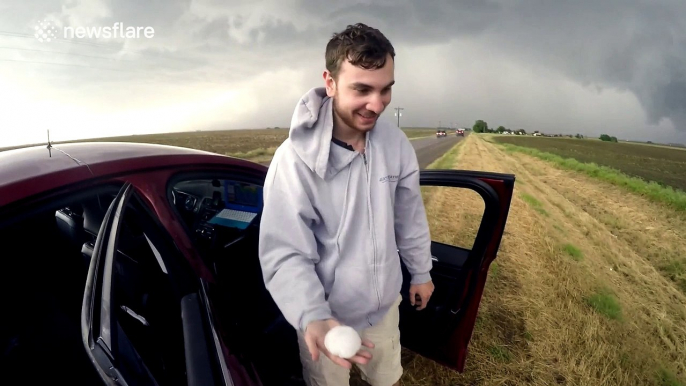 Storm chasers track large hail storm and tornadoes in Kansas