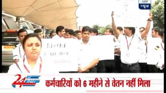 Employees of Kingfisher Airlines protest outside Mumbai airport