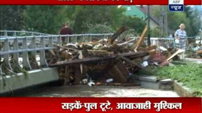 Heavy storms in Poland cause flooding and damage to homes, cars