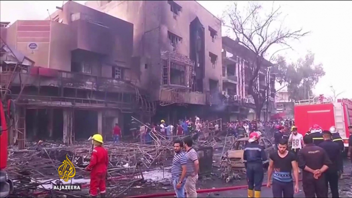 Twin bombings kill scores in Iraq’s Baghdad