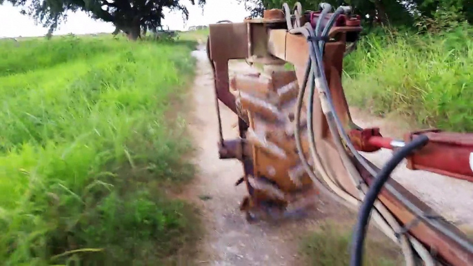 Putting the crawfish boat up in the barn.