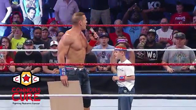 John Cena brings a brave WWE Universe member into the ring after Raw- July 4, 2016