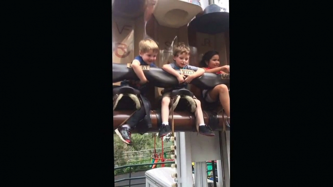 Two friends riding roller coaster at North Pole Colorado