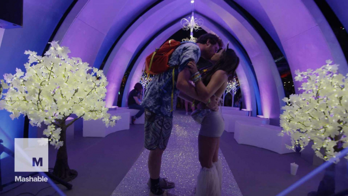 Almost 150 couples got married at a music festival...because why not?