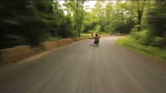 Skateboarder Rides Downhill at Insane Speed